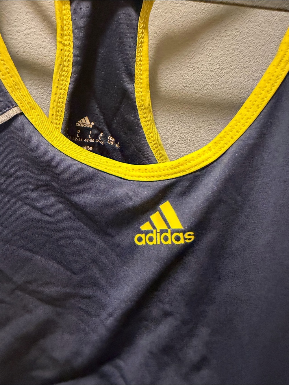 adidas navy tank with yellow accents